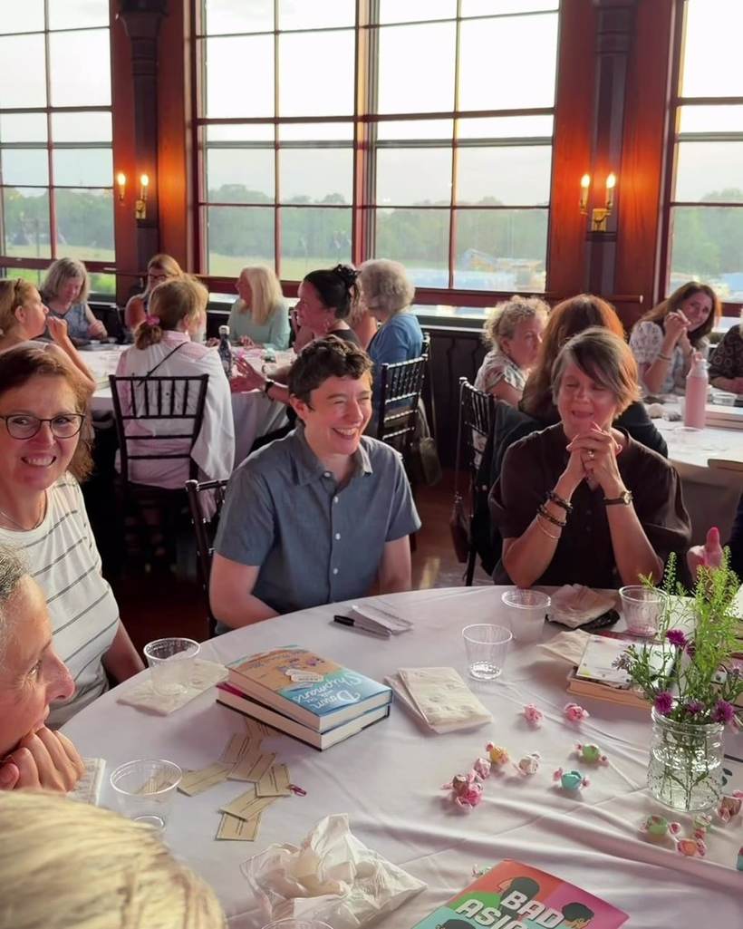 Guests at the annual Summer With Robin author dinner in Narragansett