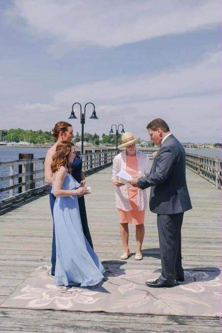 Wedding ceremony on a pier in Bristol, Rhode Island