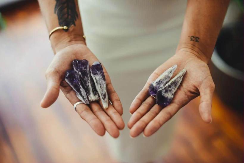 Branding photography of hands holding crystals in Newport, Rhode Island