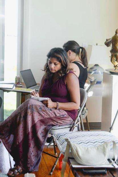 Brand photography of a small business owner working in her studio in Narragansett, Rhode Island
