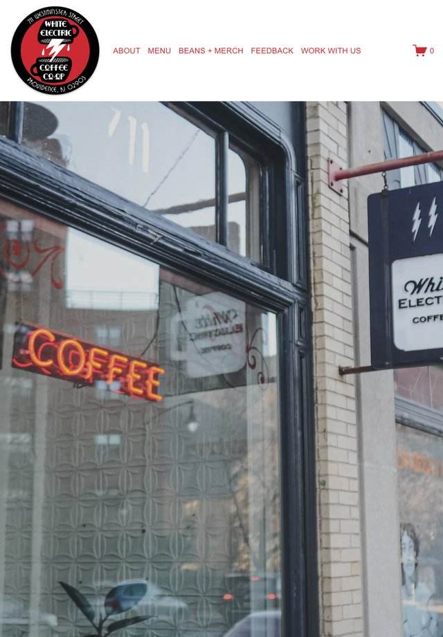 White Electric Coffee website on tablet